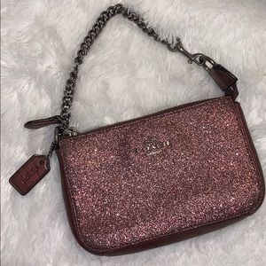 Coach purple sparkly chain wristlet.